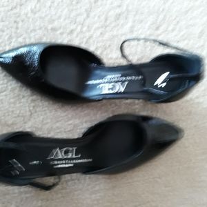 Black leather AGL pumps with an ankle strap